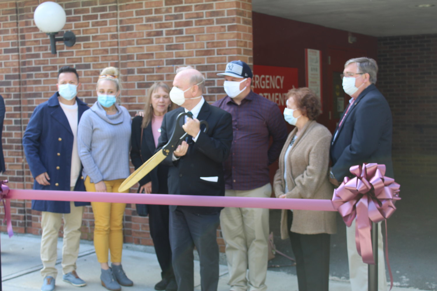 The ribbon-cutting at the entrance to the newly-revamped emergency department at Grover Hermann Hospital in Callicoon. Dr. Paul Salzberg holds the scissors.